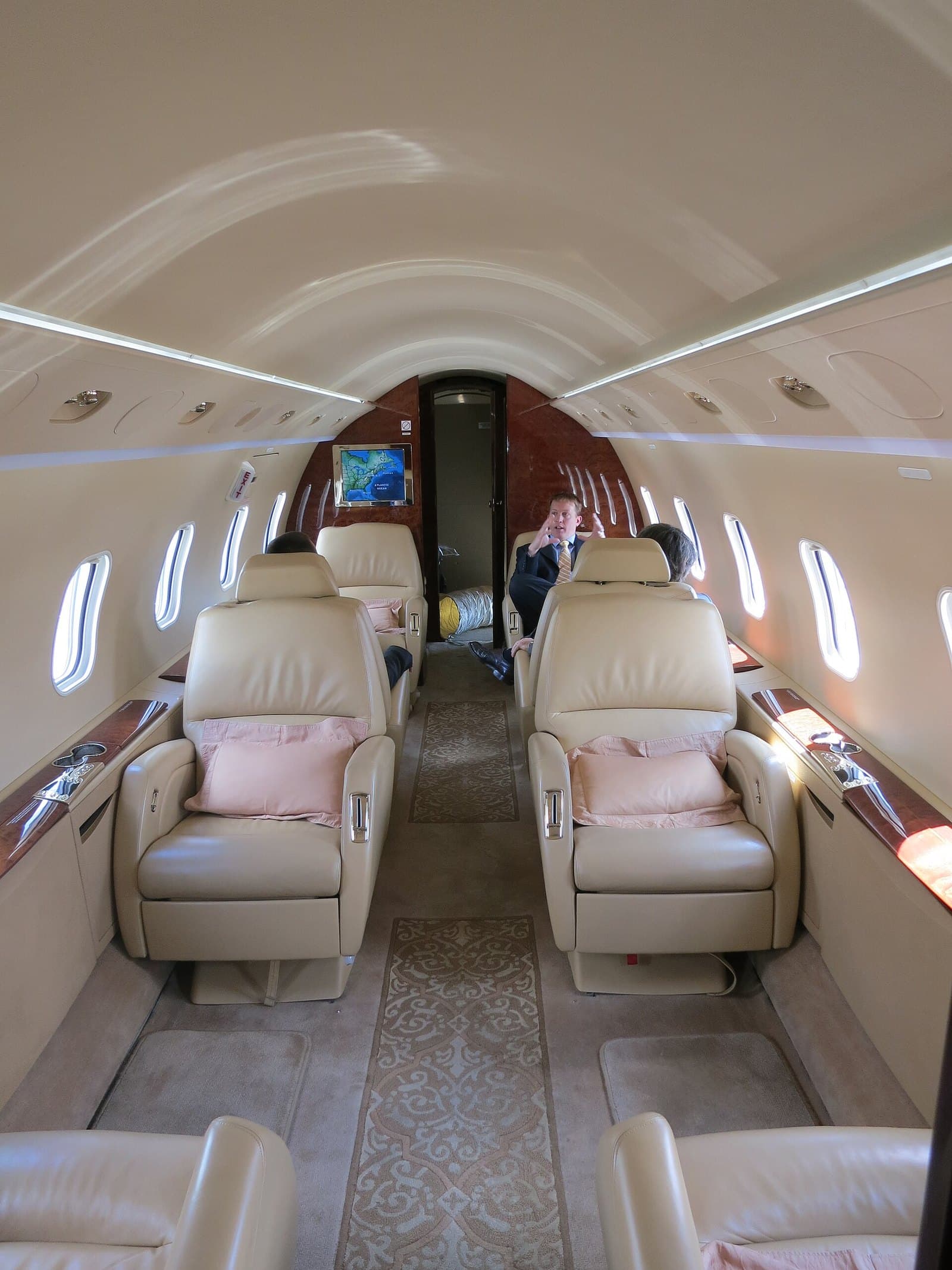 Cabin of a Bombardier Challenger 300 with leather club seats