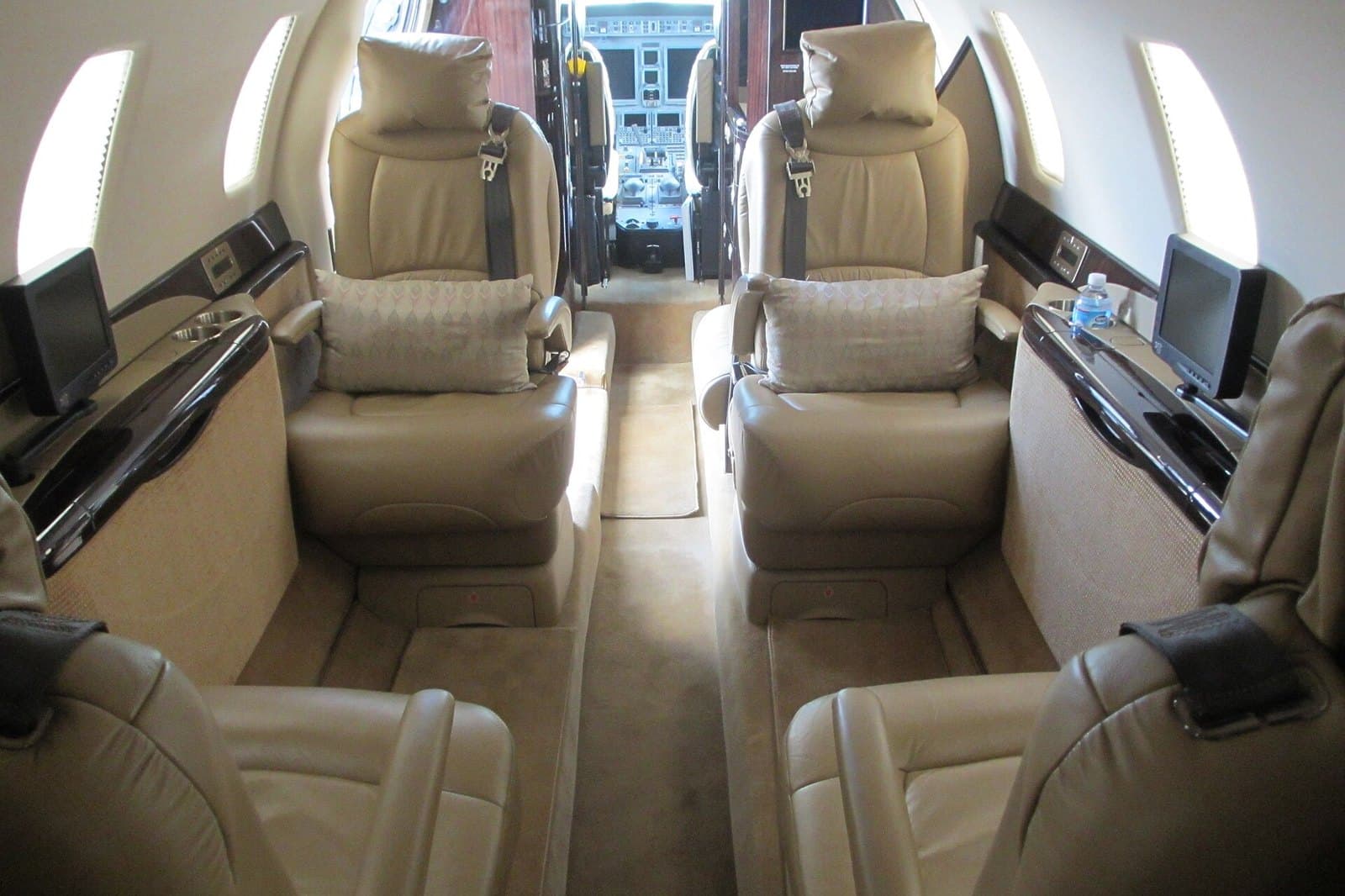 Cabin of a Cessna Citation Sovereign with leather club seats, looking forward