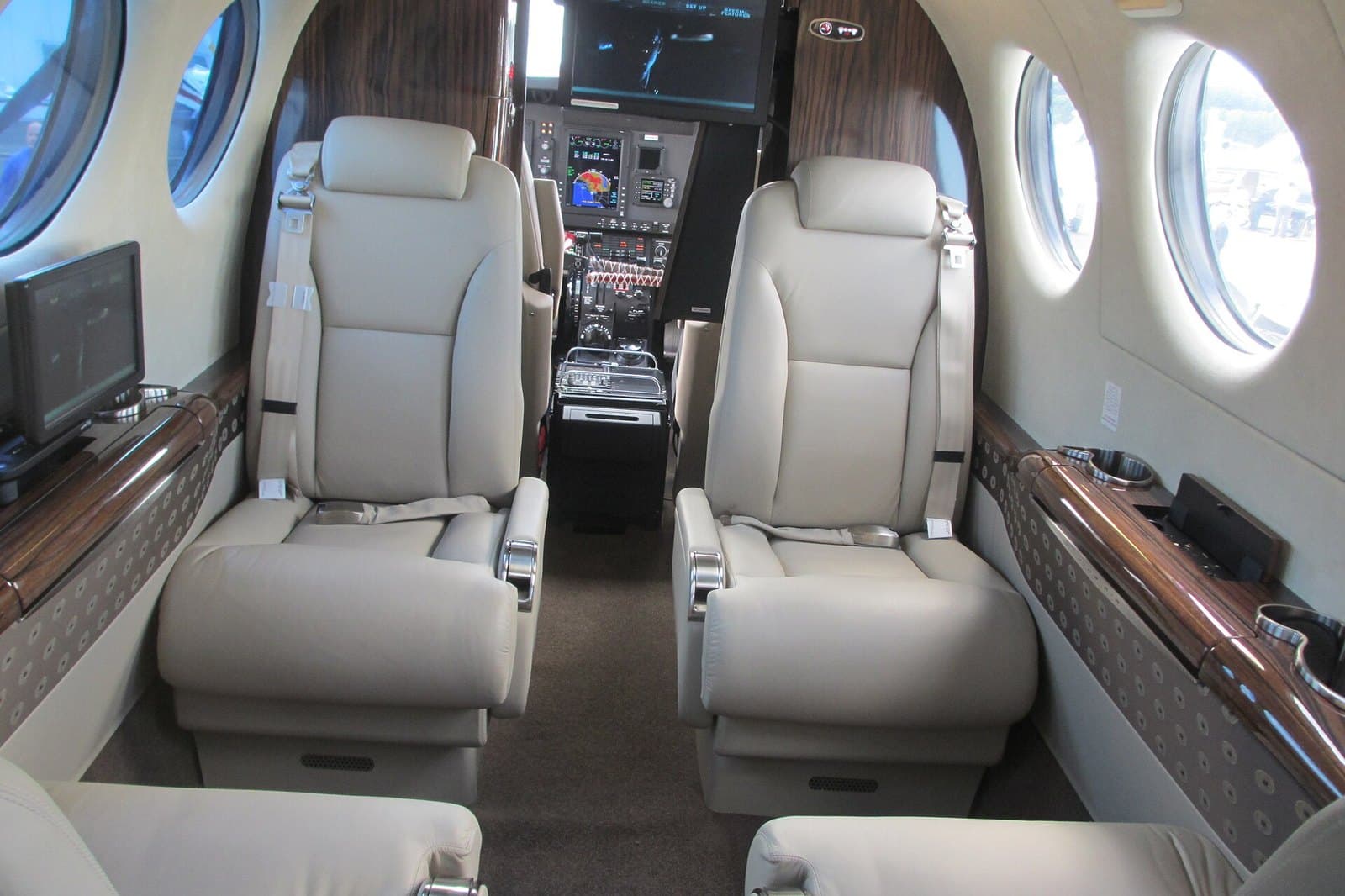 Cabin of a Beechcraft King Air 350i with leather club seats