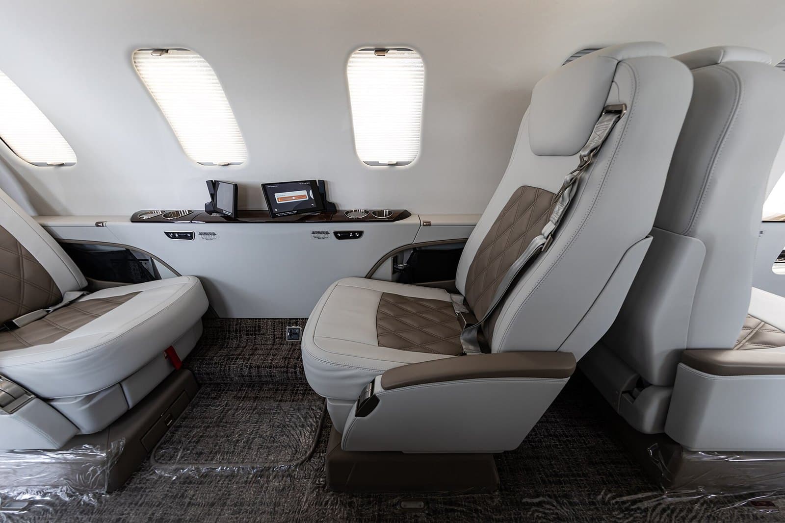 Leather seats in the cabin of a Bombardier Learjet 75