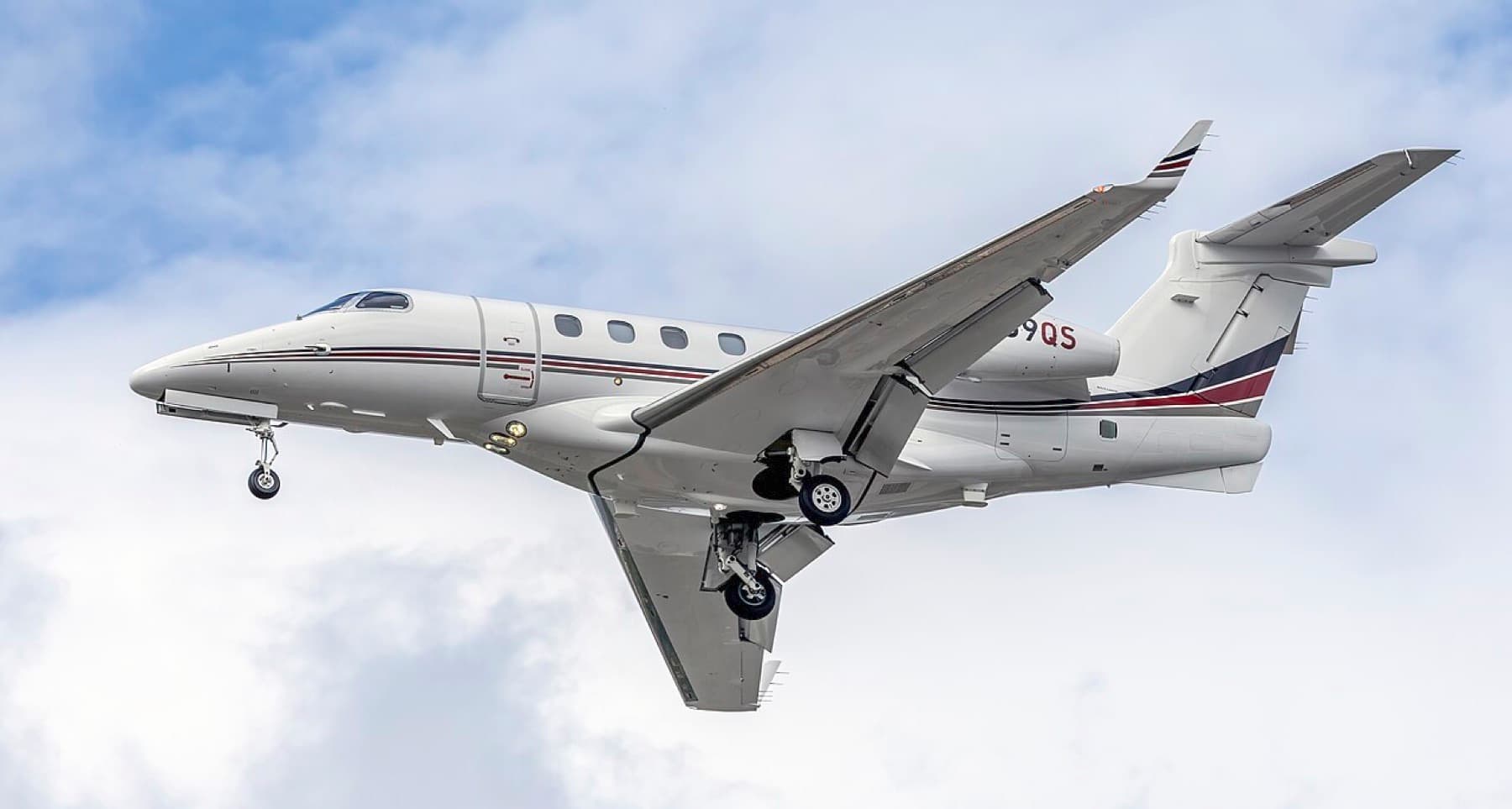 Phenom 300E in flight, representative aircraft
