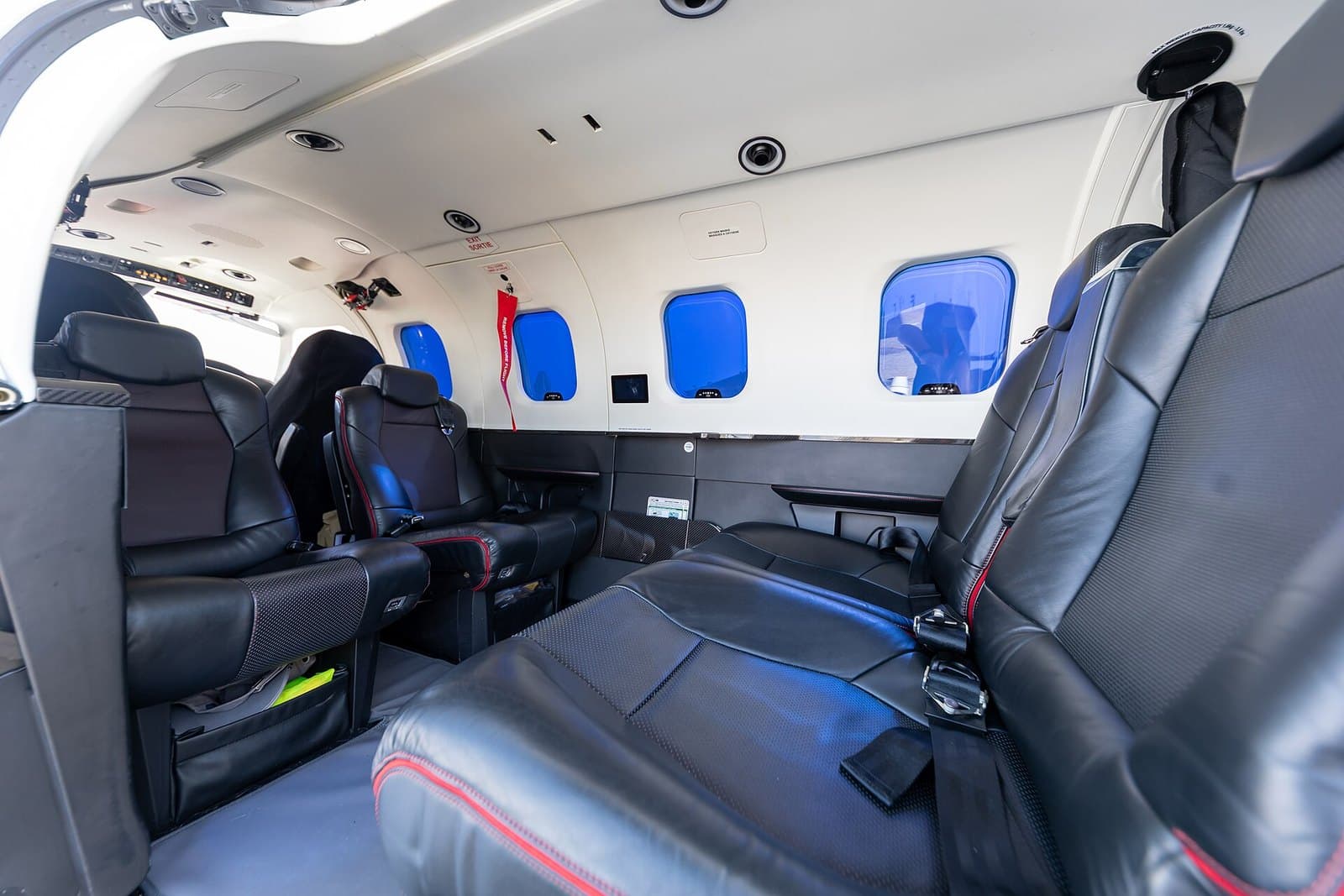Leather club seats in the cabin of a Daher TBM